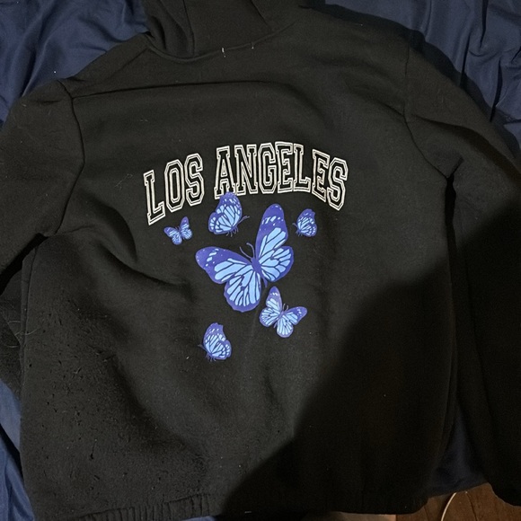 Large hoodie with butterfly sleeves and beat design in the back. - Picture 2 of 2